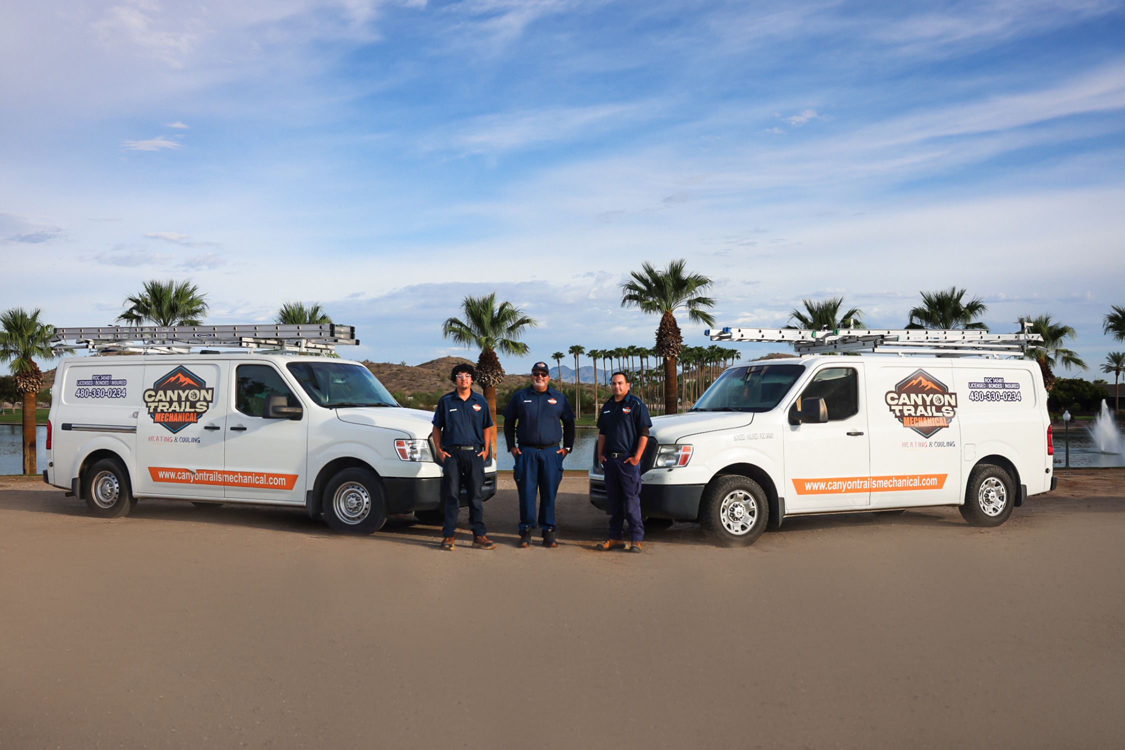 Canyon Trails Mechanical technicians beside a service van