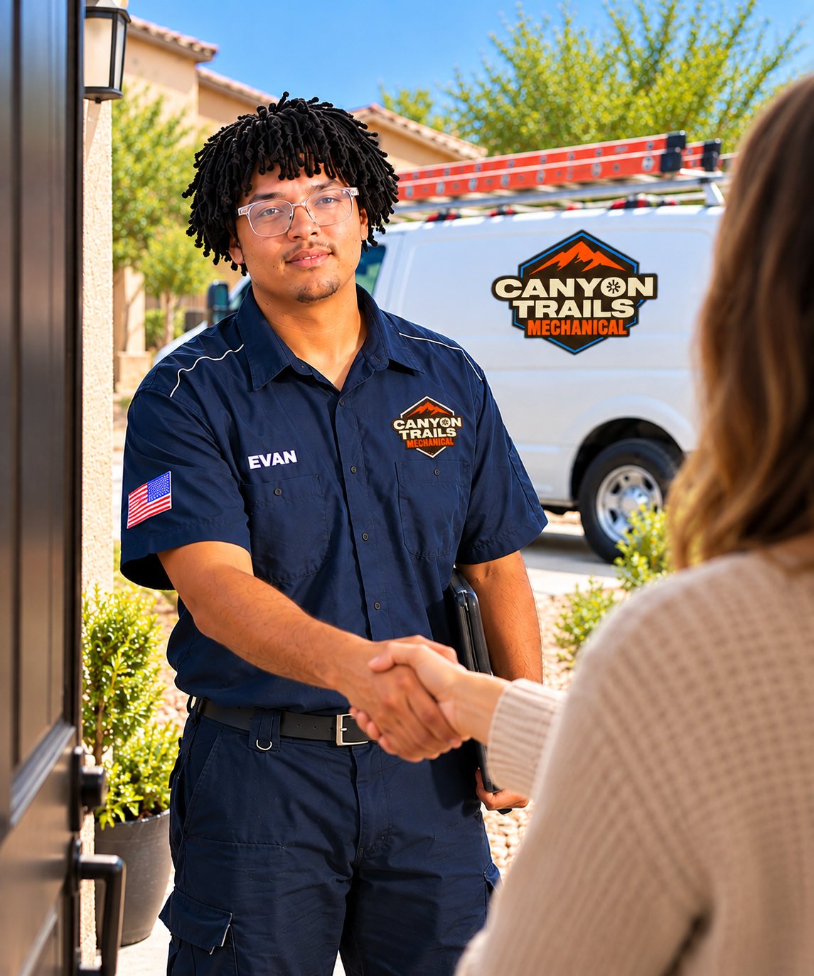 Canyon Trails Mechanical technician Evan greeting a homeowner at the front door